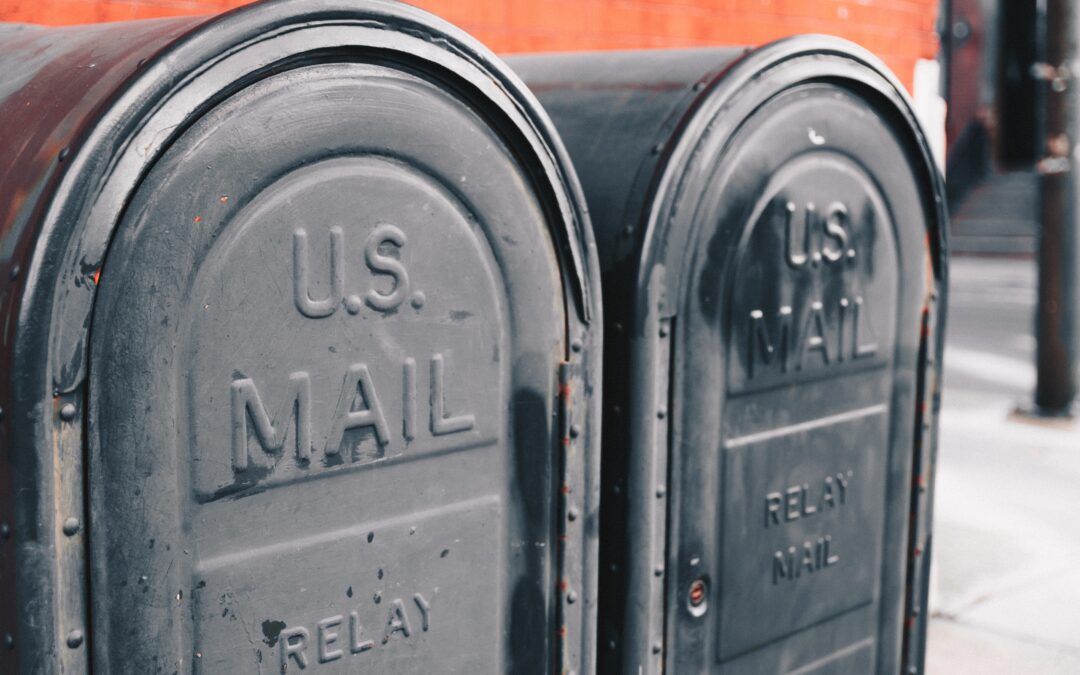 close view of two gray U.S mailboxes
