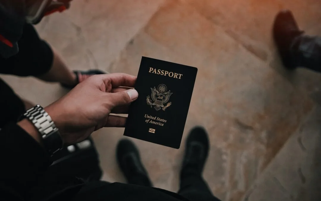 person holding passport